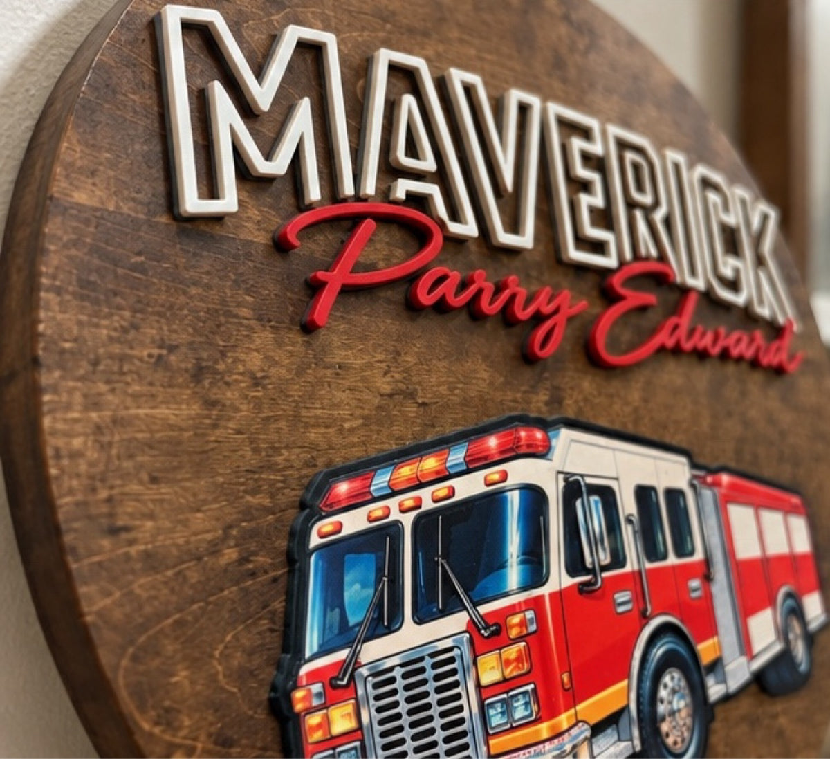 Close-up of raised lettering and UV printed fire truck