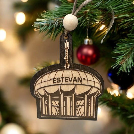 Estevan water tower wood Christmas ornament hanging on a tree